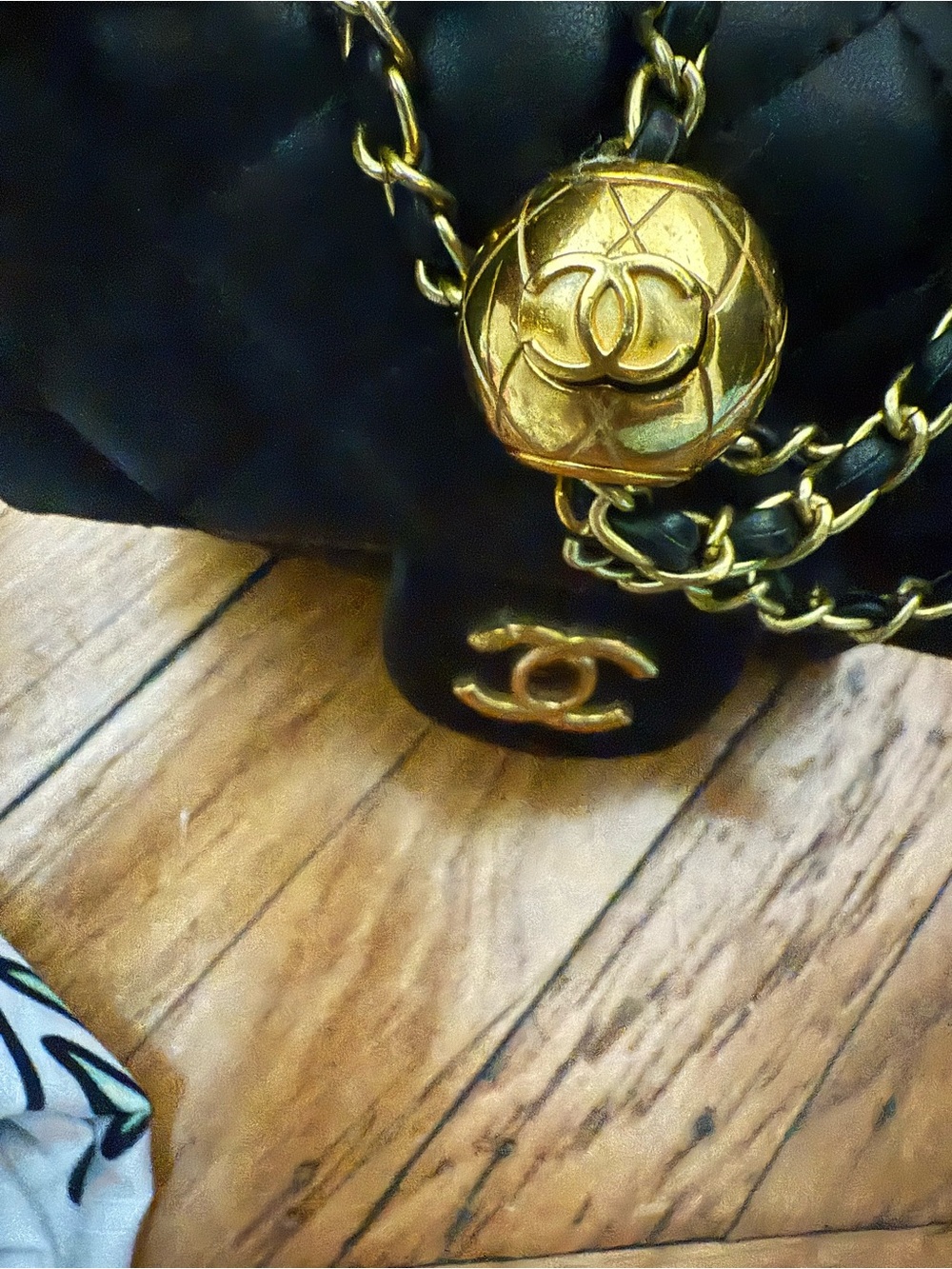 CHANEL Black Quilted Crossbody Bag with Gold-Tone Chain and CC Accents